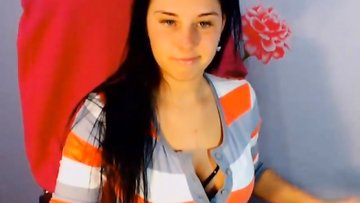 Curvy and busty teen doing a strips on cam