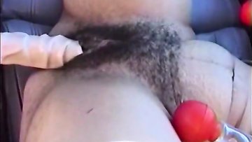 Ebony chick likes big toys