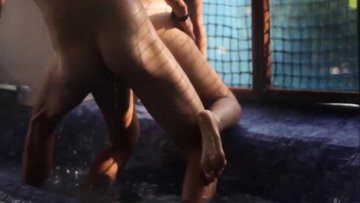 Amateur couple having sex by the window