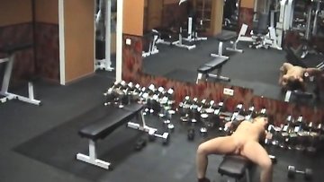 Stripping gal caught by security camera in the gym!