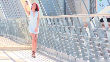 Arousing amateur babe Dani teasing pussy on a bridge