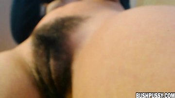 Webcamera chick spreads woolly bush for cam