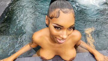 Mountainous boob ebony girlfriend close up seduces poolside on a sunny day