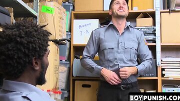 tattooed male drilling an officers expansive ebony cock