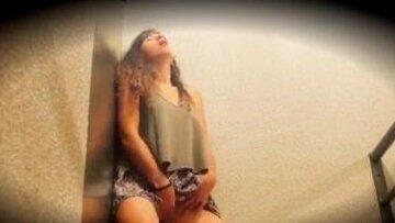 Peggy stroking in the stairwell