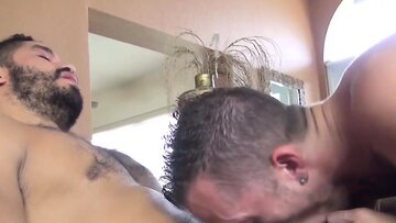 Inked jock sprayed with cum after sexy ball lickin