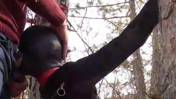 tied to a tree, banged in her throat