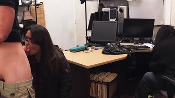 Big tits babe with glasses blows dick in pawnshop