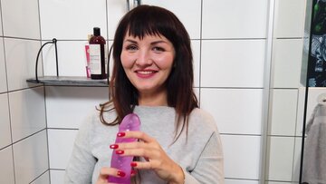 Brunette Toys Herself with Huge Dildo