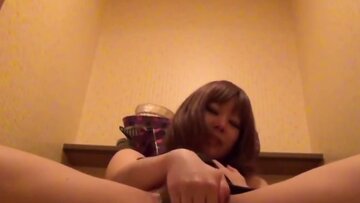 Japanese Babe Masturbates and Pees On Camera